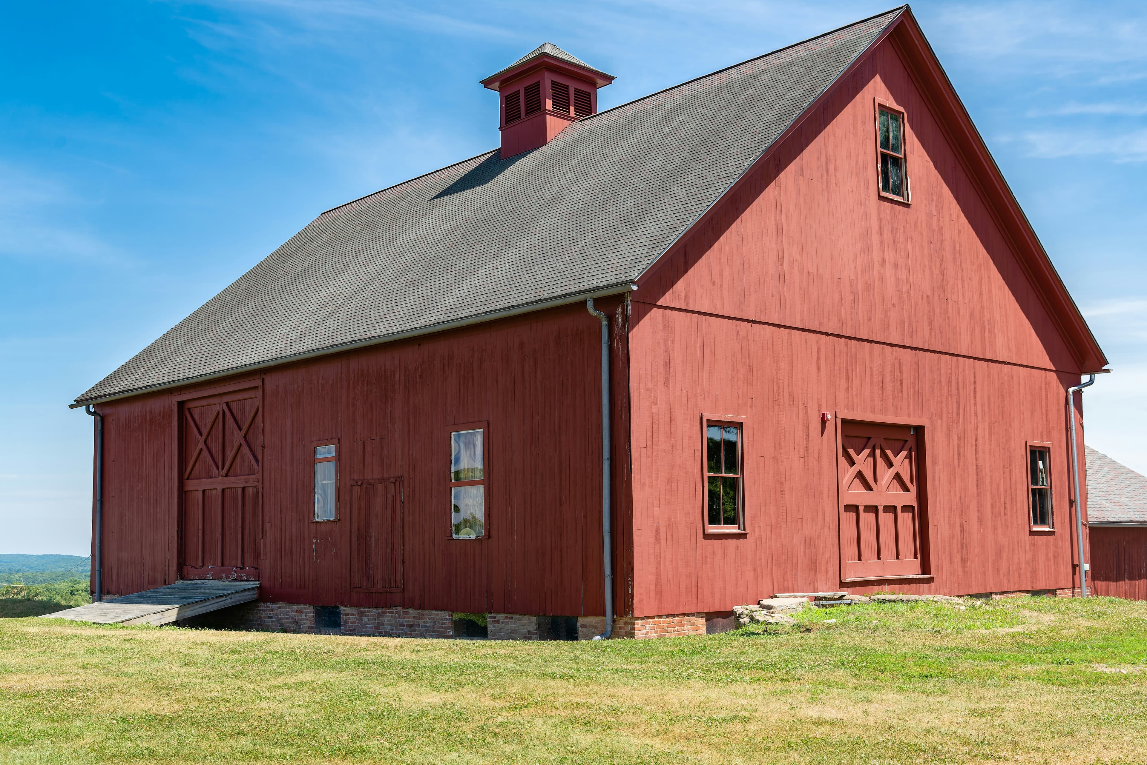 Pest Control in Bolton | Clear Pest Control Traditional red agricultural building representing pest control coverage in Bolton by Clear Pest Control