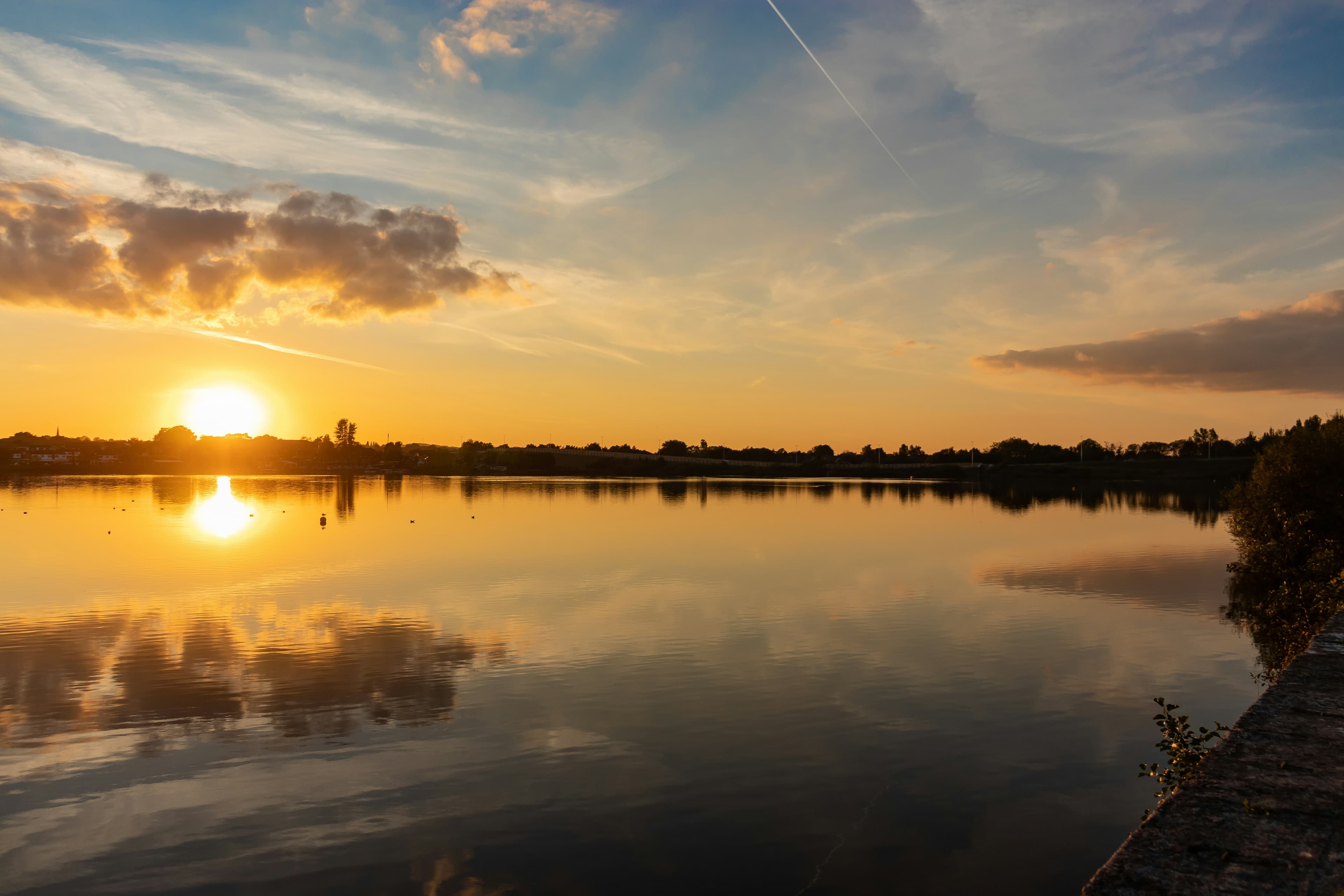 Pest Control in Wigan | Clear Pest Control Lake at sunset representing Clear Pest Control pest control coverage in Wigan